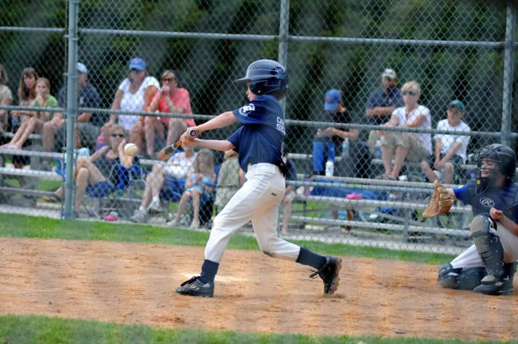 What are the age groups for Little League softball