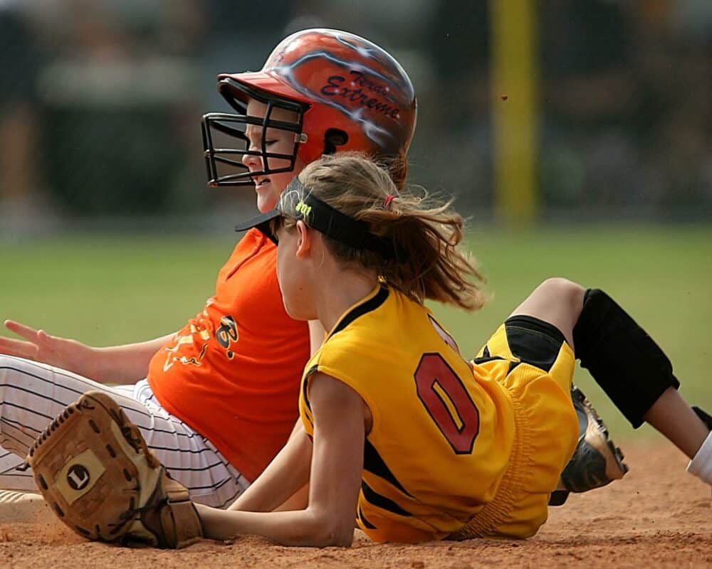 Which softball equipment is recommended for young softball players and beginners