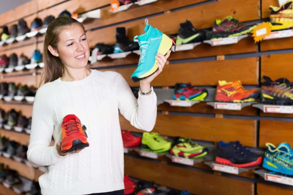 woman choosing running shoes