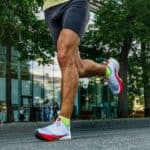 close-up legs male runner athlete run marathon race