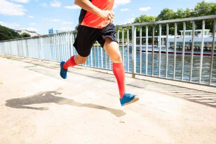 How can I prevent my running shoes from smelling bad?